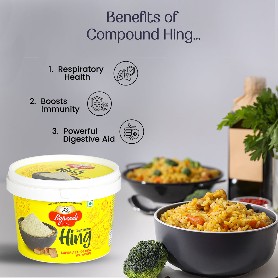 Container of compound hing- Rajwada Hing with benefits listed and a bowl of food in the background