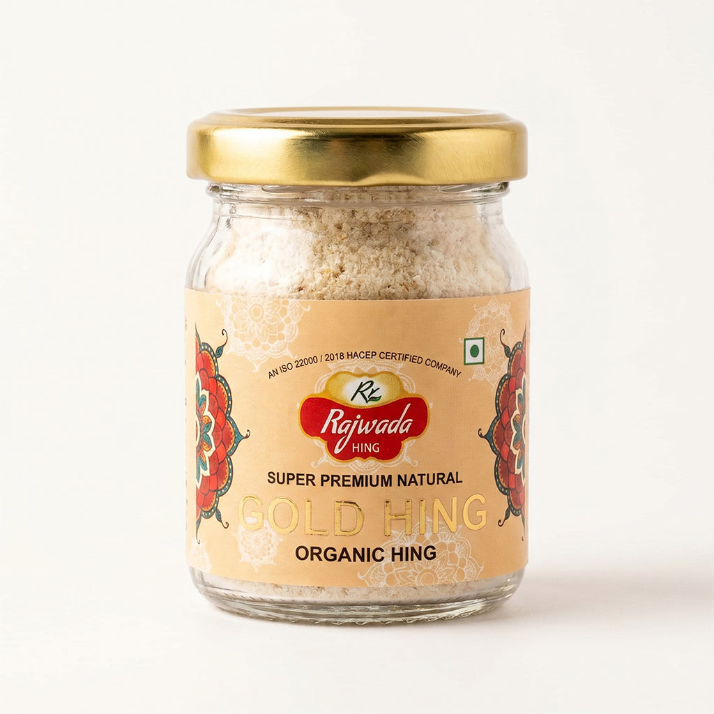 Jar of Rajwada Hing with a gold lid on a white background