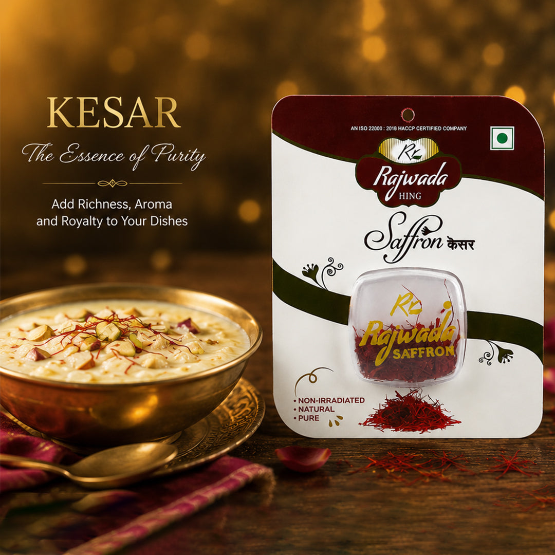 Rajwada Kesar Saffron packet shown next to a bowl of prepared saffron kheer with nuts and red garnish on a wooden table, with promotional text on the left and a warm golden bokeh background.